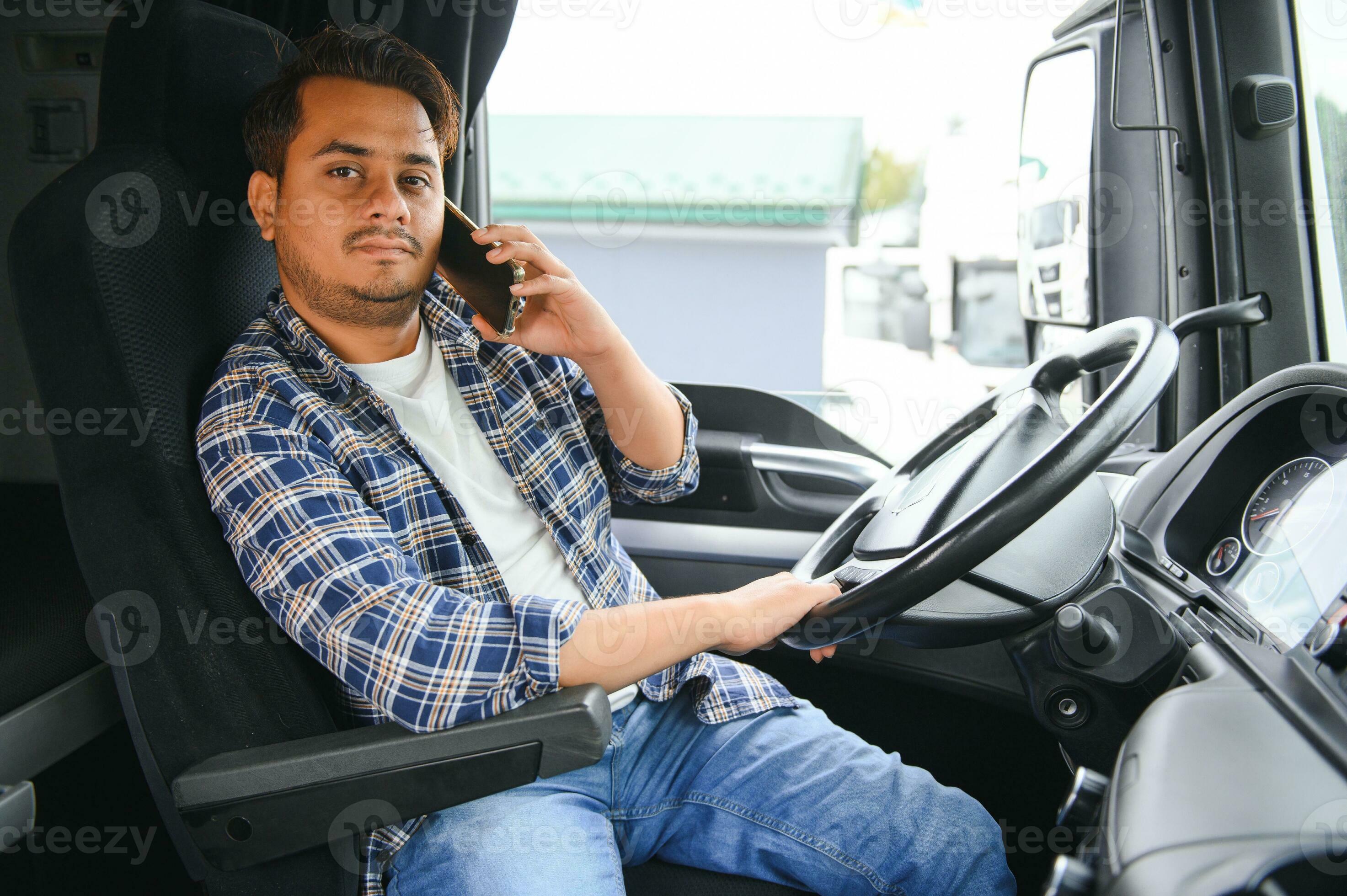 files/indian-truck-driver-tending-a-client-on-the-phone-photo.jpg